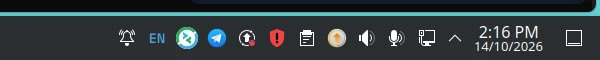 Wardie's red shield in the KDE system tray, next to the clock.